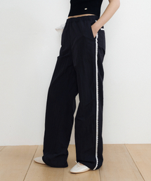 LUCIR ZU（ルシールズ）の「Lace Detail Nylon Pants (black)（スウェットパンツ）」