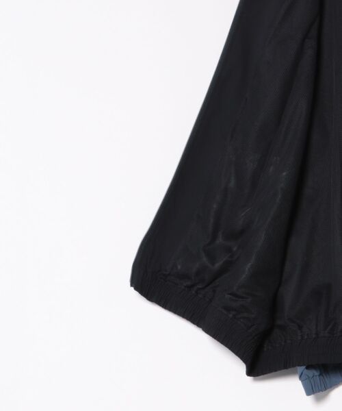NEW ERA(ニューエラ)の「NEW ERA/ニューエラ トラックジャケット セットアップ対応 14674817/14674818(ナイロンジャケット・メンズ・ブラック/ネイビー・L/M/2XL/XL)」の4枚目の写真
