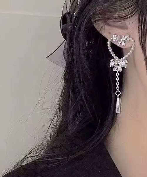 Mayree(メイリー)の「【urge select】ゆめかわ ハート×リボン パールデザイン ピアス(ピアス(両耳用)・レディース・シルバー・FREE)」の1枚目の写真