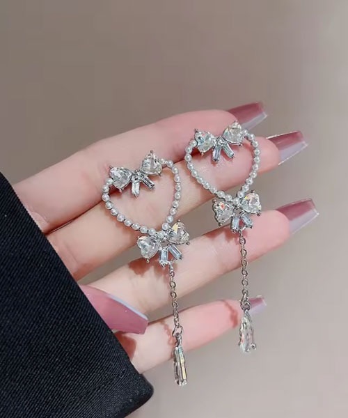Mayree(メイリー)の「【urge select】ゆめかわ ハート×リボン パールデザイン ピアス(ピアス(両耳用)・レディース・シルバー・FREE)」の2枚目の写真