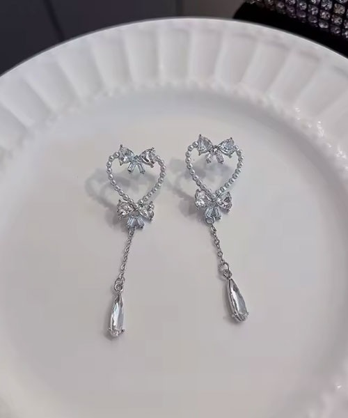 Mayree(メイリー)の「【urge select】ゆめかわ ハート×リボン パールデザイン ピアス(ピアス(両耳用)・レディース・シルバー・FREE)」の3枚目の写真