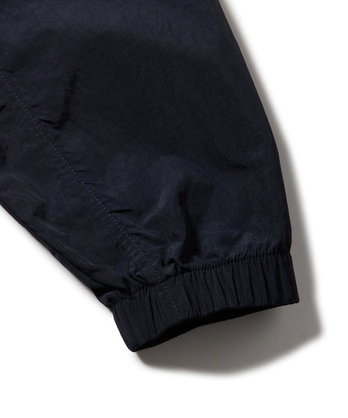 NEW ERA（ニューエラ）の「NEW ERA/ニューエラ ナイロン ウーブン トラックジャケット 14674821/14674822（ナイロンジャケット・メンズ・ネイビー/ブラック・M/L/XL/2XL）」の20枚目の写真