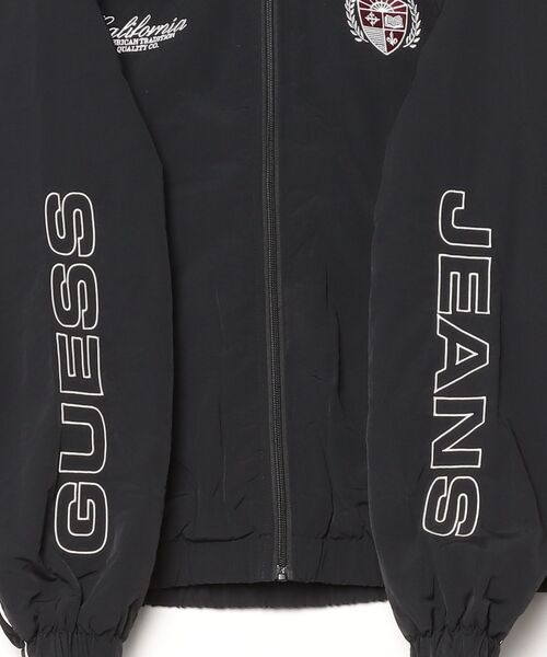 GUESS JEANS(ゲスジーンズ)の「GUESS JEANS Emb Track Jacket ジャケット ナイロンジャケット セットアップ(ナイロンジャケット・メンズ・ブラック・X-LARGE/LARGE/MEDIUM/SMALL/XX-LARGE)」の3枚目の写真