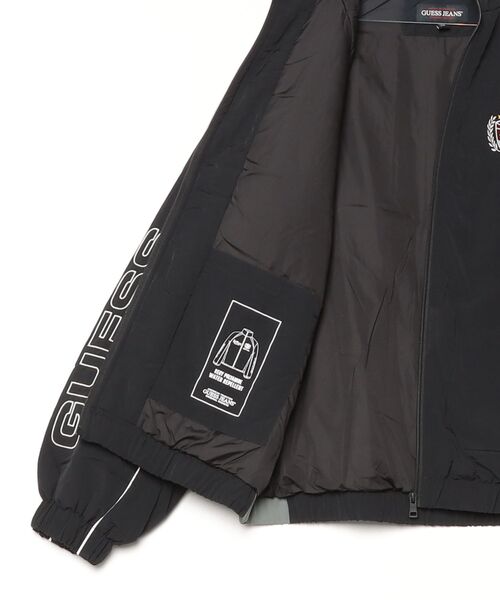 GUESS JEANS(ゲスジーンズ)の「GUESS JEANS Emb Track Jacket ジャケット ナイロンジャケット セットアップ(ナイロンジャケット・メンズ・ブラック・X-LARGE/LARGE/MEDIUM/SMALL/XX-LARGE)」の4枚目の写真