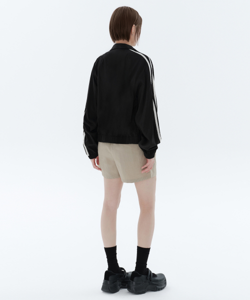 MUSINSA STANDARD WOMAN(ムシンサスタンダードウーマン)の「ウーマンズナイロンバンディングショーツ【ライトベージュ】(その他パンツ・レディース・その他・30/24/26/28)」の3枚目の写真