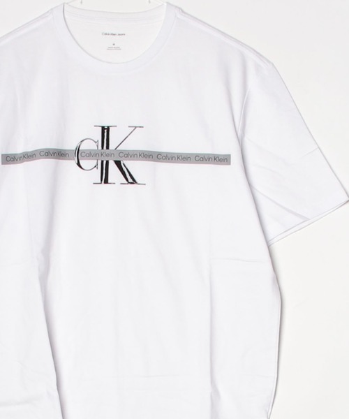 Calvin Klein(カルバン・クライン)の「CALVIN KLEIN カルバンクライン SS TAPE REPEAT LAYERED LOGO CREWNK TEE ckグラフィックロゴプリント半袖Tシャツ(Tシャツ/カットソー・メンズ・ブラック/ホワイト・M/L/XL/S)」の1枚目の写真