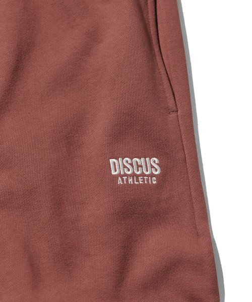 DISCUS ATHLETIC(ディスカス アスレチック)の「ヘビーウェイトレターロゴスウェットパンツブリックレッド(スウェットパンツ・レディース・その他・X-LARGE/SMALL/MEDIUM/LARGE)」の6枚目の写真