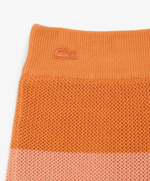 LACOSTE(ラコステ)の「ボーダーメッシュニットショーツ(その他パンツ・レディース・オレンジ・36/38)」の4枚目の写真