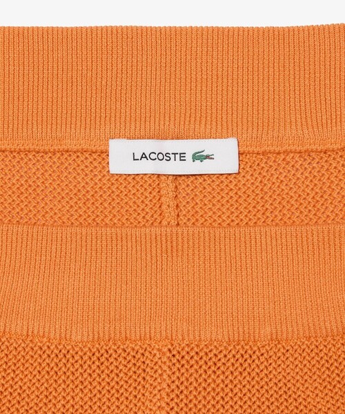 LACOSTE(ラコステ)の「ボーダーメッシュニットショーツ(その他パンツ・レディース・オレンジ・36/38)」の3枚目の写真