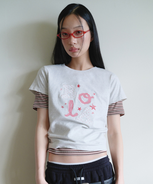 ROLAROLA(ロラロラ)の「ROLA LETTERING PATCHWORK T-SHIRT MELANGE WHITE(Tシャツ/カットソー・レディース・オフホワイト・SMALL/MEDIUM)」の2枚目の写真