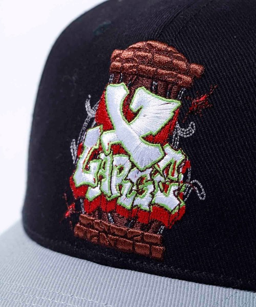 XLARGE(エクストララージ)の「SMASH A CAGE 2TONE CAP(キャップ・メンズ・ブラウン/ブラック/ネイビー・ONE SIZE)」の4枚目の写真