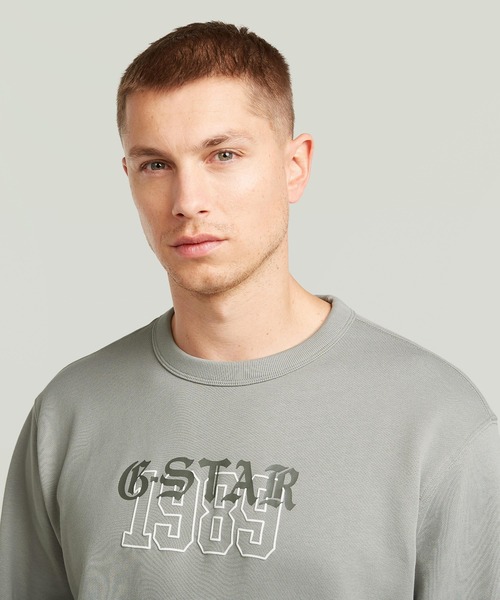 G-STAR(ジースター)の「1989 Graphic Sweater/グラフィックロゴスウェット/トレーナー(スウェット・メンズ・グレー/ダークブラック・LARGE/X-LARGE/MEDIUM/SMALL/X-SMALL)」の10枚目の写真