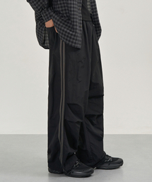 EXCONTAINER（エックスコンテナ）の「サイドラインナイロントラックパンツ（ブラック）（スウェットパンツ）」