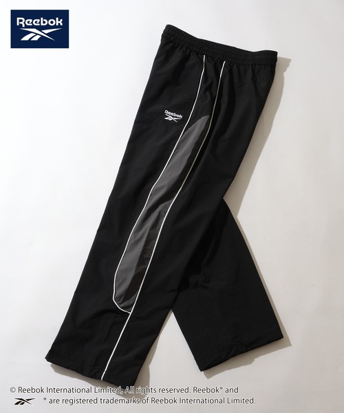 Reebok(リーボック)の「【Reebok/リーボック】パイピング デザイン ナイロン パンツ(その他パンツ・メンズ・ブラック/ネイビー/グリーン/ダークブラウン・M/L/LL)」の7枚目の写真