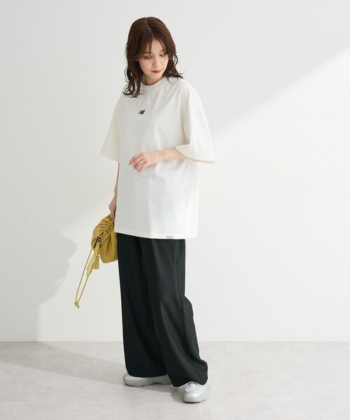 EU,US NEW BALANCE(イーユーユーエスニューバランス)の「●NEW BALANCE グラフィックTシャツ(Tシャツ/カットソー・レディース・オフホワイト/ブラック・M)」の5枚目の写真