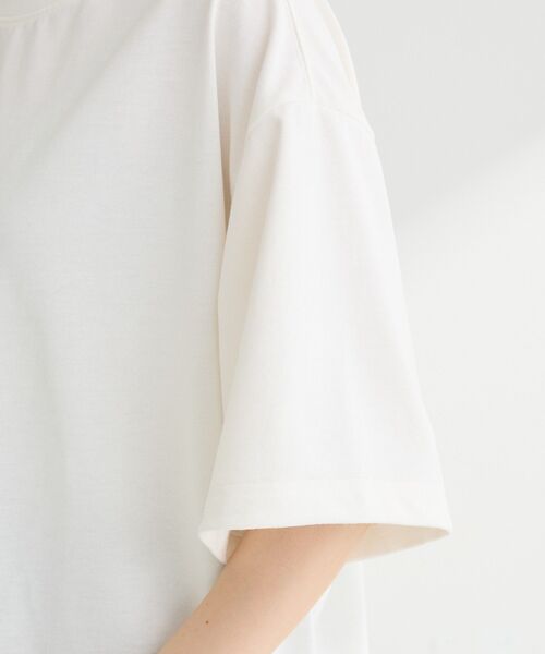 EU,US NEW BALANCE(イーユーユーエスニューバランス)の「●NEW BALANCE グラフィックTシャツ(Tシャツ/カットソー・レディース・オフホワイト/ブラック・M)」の12枚目の写真
