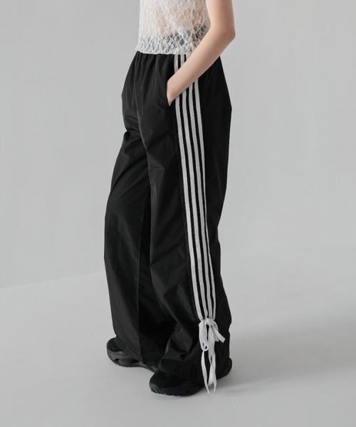 Uenui(ウニュイ)の「リボントラックパンツ トラックパンツ ストレートパンツ ナイロン サイドライン ジャージ(その他パンツ・レディース・ブラック・FREE)」の12枚目の写真