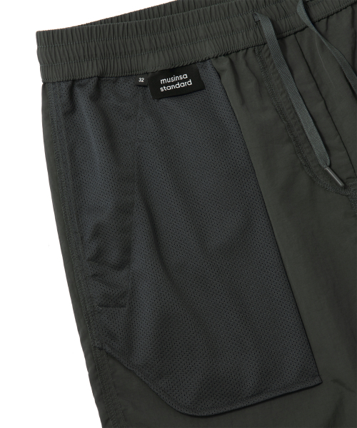 MUSINSA STANDARD（ムシンサスタンダード）の「ナイロンバンディングショーツ_7.5インチ [ディープカーキ]（その他パンツ・メンズ・その他・26）」の7枚目の写真
