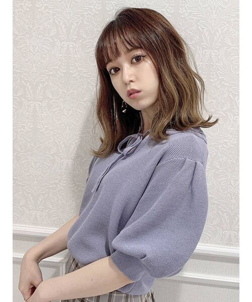 dazzlin(ダズリン)の「ハニカムリボンコンパクトトップス(ニット/セーター・レディース・オフホワイト/ブルー/マスタード/ブラック・FREE)」の6枚目の写真