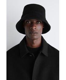 COS（コス）の「ウール混バケットハット（ハット）」