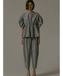 enchainement（アンシェヌマン）の「シャンタンペプラムトップス