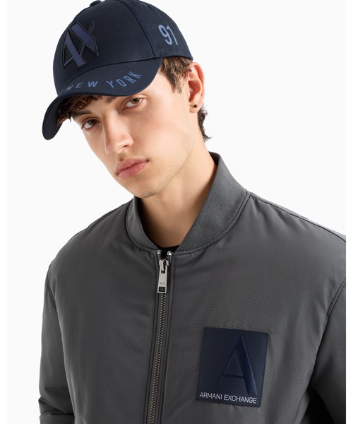 ARMANI EXCHANGE(アルマーニエクスチェンジ)の「【A|X アルマーニ エクスチェンジ】AXロゴ キャップ(EC限定カラー含)(キャップ・メンズ・オフホワイト/ネイビー・FREE)」の5枚目の写真
