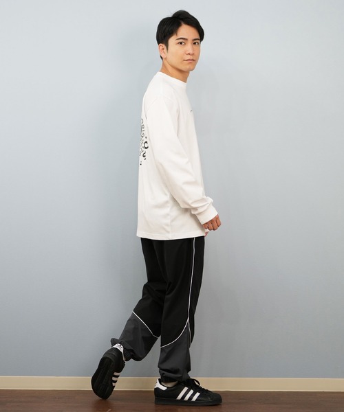 NEW ERA(ニューエラ)の「NEW ERA/ニューエラオーバーサイズド パイピング トラックパンツ ロンパン セットアップ対応 14674815/14674816(その他パンツ・メンズ・ブラック/ネイビー・2XL/M/XL/L)」の15枚目の写真
