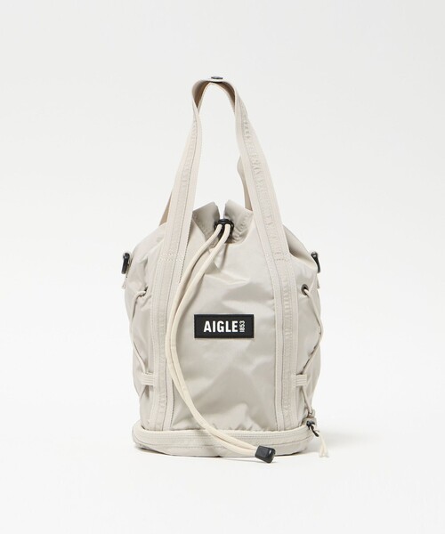AIGLE(エーグル)の「<AIGLE>コンパクト 2WAY ドロストバッグ(ショルダーバッグ・レディース・ナチュラル/オレンジ・FREE)」の1枚目の写真