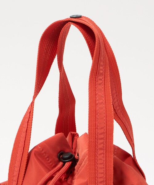 AIGLE(エーグル)の「<AIGLE>コンパクト 2WAY ドロストバッグ(ショルダーバッグ・レディース・ナチュラル/オレンジ・FREE)」の5枚目の写真