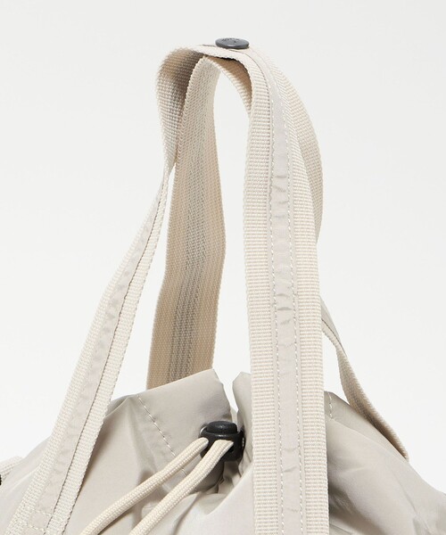 AIGLE(エーグル)の「<AIGLE>コンパクト 2WAY ドロストバッグ(ショルダーバッグ・レディース・ナチュラル/オレンジ・FREE)」の8枚目の写真