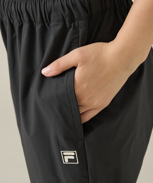 FILA（フィラ）の「【ELEY KISHIMOTO×FILA】イーリーキシモト×フィラ トラックパンツ / ユニセックス / SM6FCU720（その他パンツ・メンズ・カーキ/ブラック・L/M）」の20枚目の写真
