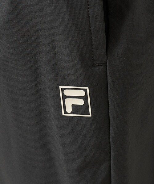 FILA（フィラ）の「【ELEY KISHIMOTO×FILA】イーリーキシモト×フィラ トラックパンツ / ユニセックス / SM6FCU720（その他パンツ・メンズ・カーキ/ブラック・L/M）」の21枚目の写真