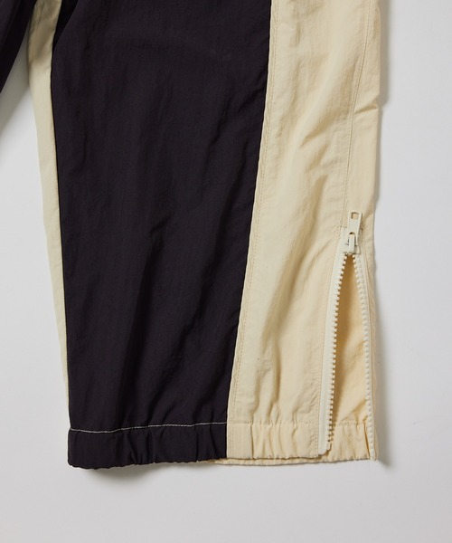 ADAM ET ROPE'(アダムエロペ)の「《別注》【UMBRO/アンブロ】TRACK PANTS(その他パンツ・メンズ・キナリ/ネイビー・L/XL)」の13枚目の写真