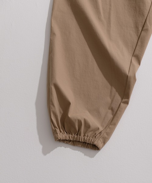 NIDO(ニド)の「ナイロンストレッチパンツ(その他パンツ・メンズ・ブラック/ベージュ・MEDIUM/LARGE)」の16枚目の写真