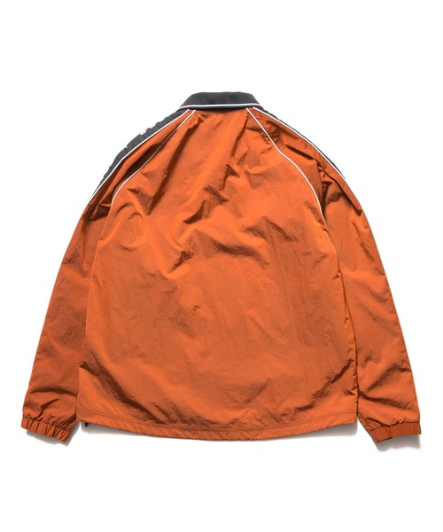 F.C.Real Bristol(エフシーレアルブリストル)の「NYLON CHAMBRAY PRACTICE PISTE(ブルゾン・メンズ・ブラック/オレンジ/チャコールグレー・MEDIUM/LARGE/XX-LARGE/X-LARGE/SMALL)」の6枚目の写真