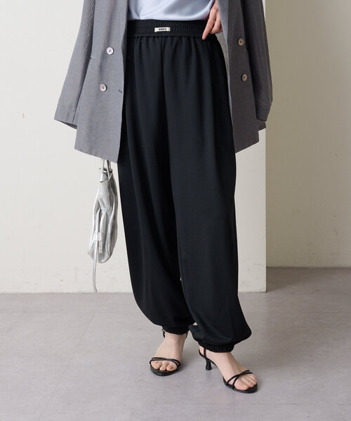 Omekashi(オメカシ)の「NUDEDジャージーパンツ(その他パンツ・レディース・アイボリー/ブラック・36/38)」の2枚目の写真