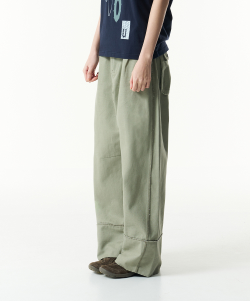 THECOLDESTMOMENT(ザコールデストモーメント)の「TCM cut out offset pocket pants (green)(その他パンツ・レディース・その他・SMALL/MEDIUM/LARGE)」の1枚目の写真