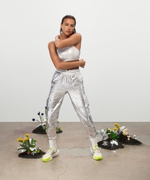 adidas（アディダス）の「Ivy Park メタリック トラックパンツ（オールジェンダー）/ アディダスオリジナルス（その他パンツ）」