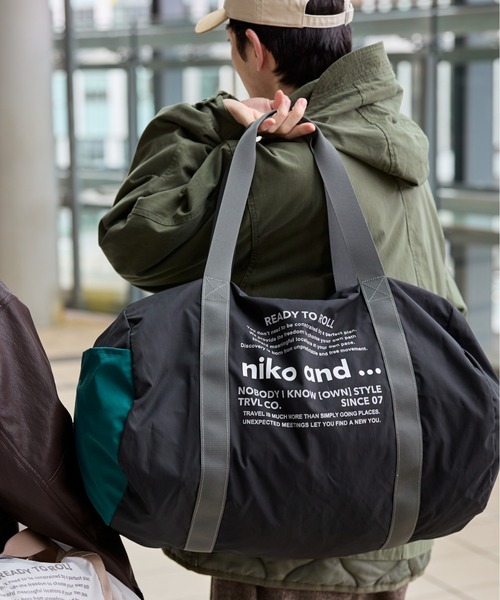 niko and...（ニコアンド）の「ニコロゴドラムバッグ２（トラベルグッズ・レディース・ブラック/アイボリー・XX-SMALL）」の2枚目の写真