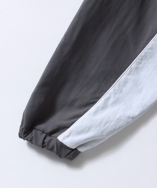 Mark Gonzales（マーク・ゴンザレス）の「MARK GONZALES ARTWORK COLLECTION/マークゴンザレス 別注 ワンポイント刺繍 オーバーサイズ ブロークコア ナイロンジャケット トラックジャケット ブルゾン（ナイロンジャケット・メンズ・チャコール/ブラック/ブラック系その他・M/L/XL）」の7枚目の写真