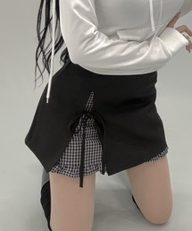 FOLLOWIN（フォロウィン）の「レイヤード風チェックリボン付きスリットデザイン台形スカート（スカート・レディース）」
