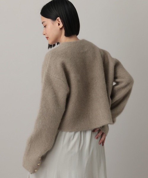 A part by（アパートバイ）の「CNラクーンコンキンボタンカーディガン