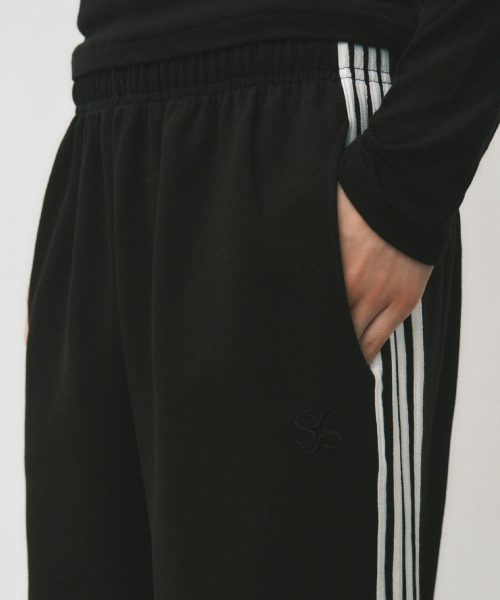 WEDNESDAYOASISFORWOMEN（ウェンズデー オアシス フォー ウーマン）の「W/ニュートロライントラックパンツ_BLACK(W25-PT25)（スウェットパンツ・レディース・ブラック・MEDIUM/LARGE）」の3枚目の写真