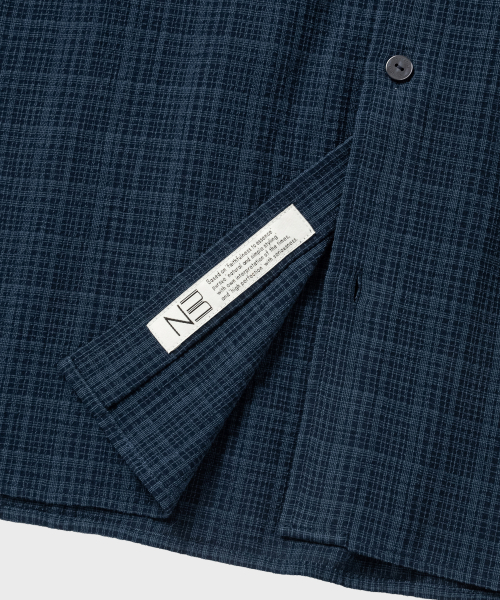 NONBLANK(ノンブランク)の「イレギュラーウィンドウチェッククロップHSシャツ_DARK BLUE(シャツ/ブラウス・メンズ・ダークブルー・SMALL/MEDIUM/LARGE/X-LARGE)」の9枚目の写真
