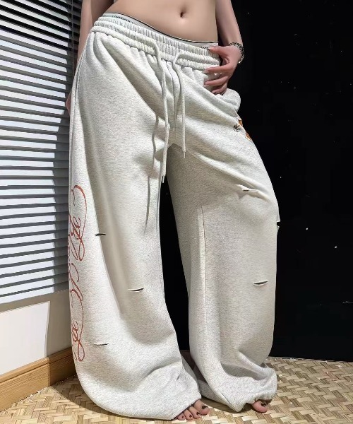 Achic(アシック)の「サイドロゴルーズスウェットパンツ(スウェットパンツ・レディース・グレー/ブラック・S/M)」の1枚目の写真
