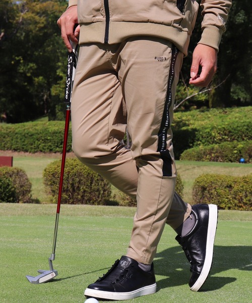 LUXE/R GOLF(ラグジュ ゴルフ)の「(RM)【LUXE/R GOLF】ストレッチ クロス サイドライン プリント チノパンツ(チノパンツ・メンズ・グレー/ブラック/カーキ/ベージュ・XL/L/M)」の1枚目の写真