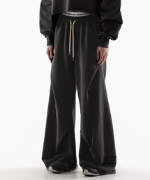 FANSHOW（ファンショー）の「MWL スモールジオメトリーフレアスウェットパンツ - ピグメントブラック（スウェットパンツ）」