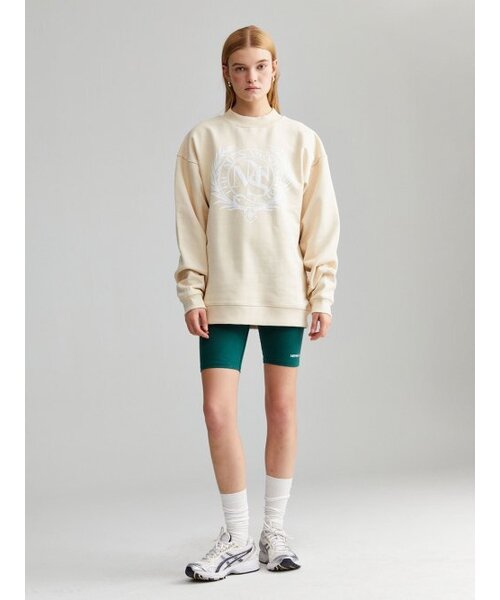 MENASOO(ミナス)の「UNISEX HERITAGE EMBLEM MOCK-NECK SWEATSHIRT IVORY(スウェット・メンズ・アイボリー・FREE)」の4枚目の写真