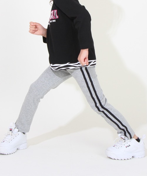 BABYDOLL（ベビードール）の「通販限定カラー/サイズあり ウルトラストレッチロングパンツ [総柄] 10分丈 8344K（その他パンツ・キッズ・チャコールグレー/ブラック系2/バイオレット/ブラック系その他/ストーン/イエロー×グリーン/ネイビー/ホワイト/ダークブラウン系/ピンク系その他7/ブラック系1/ブラック×ホワイト/レッド系その他/サーモンピンク/ネイビー×ホワイト/オフホワイト/ブラウン系その他/ブラック系その他2/ピンク系その他/ベージュ/パープル/ベビーピンク/イエローゴールド/ベージュ系その他・90cm/100cm/110cm/120cm/130cm/140cm/150cm/80ｃｍ/90㎝）」の9枚目の写真