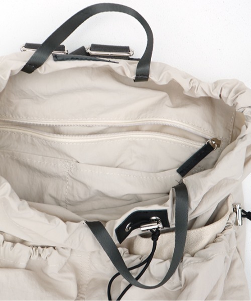 EARTH MADE(アースメイド)の「DRAWSTRING BACKPACK(バックパック/リュック・レディース・ブラック/アイボリー/ブルー/マスタード・フリー)」の5枚目の写真